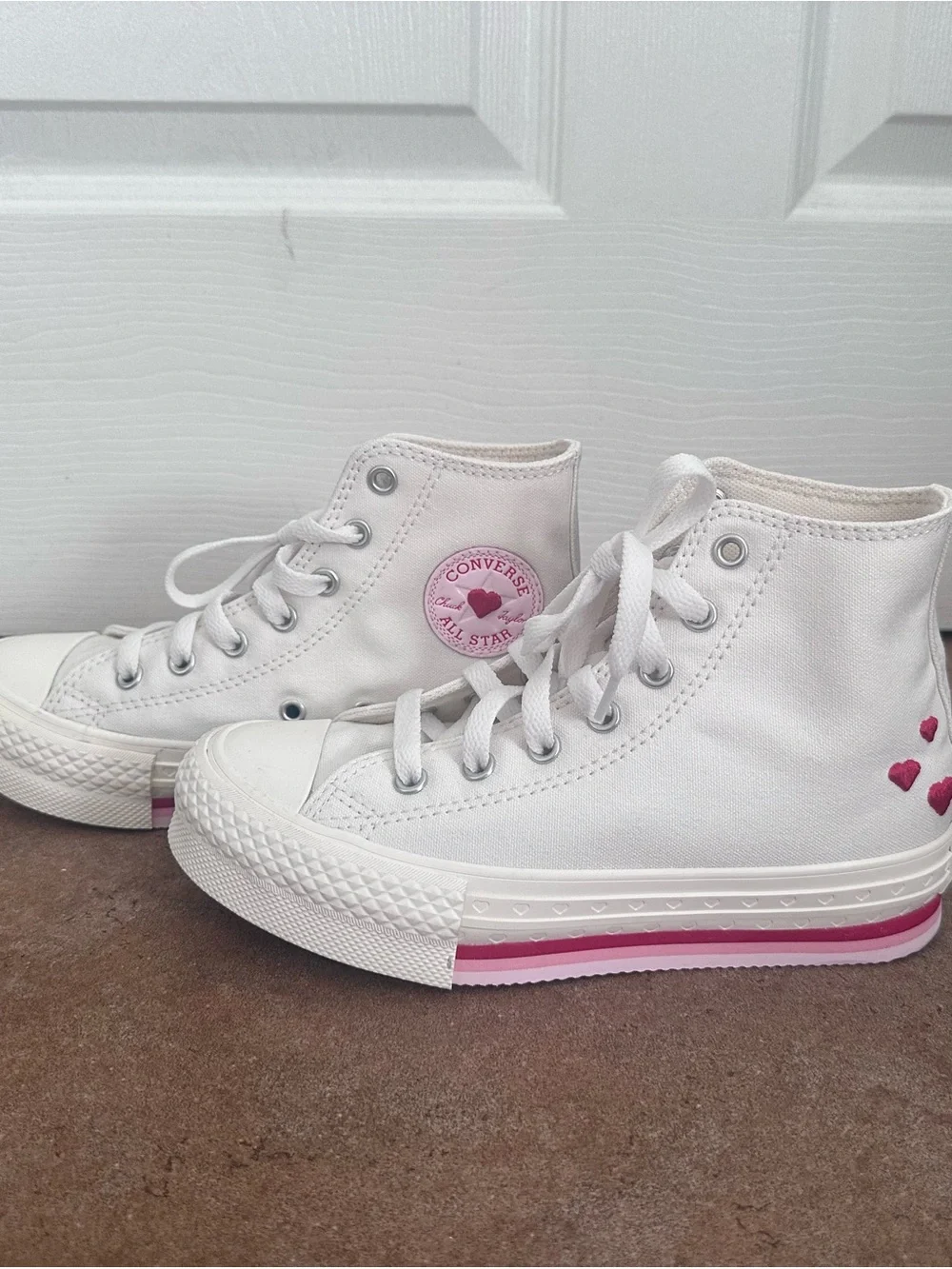 Converse White High-Top Sneakers with Pink Accents